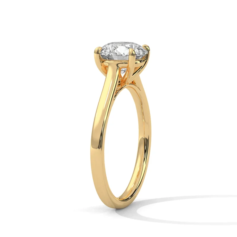novafacet-knife-edge-round-solitaire-ring-yellow-gold-angle-1